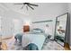 Tranquil main bedroom with a vaulted ceiling, a large mirror, and an ensuite bathroom at 2408 Fordcrest Dr, Apex, NC 27502