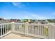 Community view from balcony of neighborhood houses and blue skies, offering a scenic residential perspective at 249 Salt Cedar Ln, Chapel Hill, NC 27516