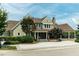 Stunning clubhouse featuring stone accents, multiple gables, and a covered entrance with a stone walkway at 249 Salt Cedar Ln, Chapel Hill, NC 27516