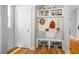Inviting mudroom with coat hooks, bench seating, storage cubbies, and stylish decor for an organized entryway at 249 Salt Cedar Ln, Chapel Hill, NC 27516