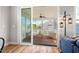Inviting screened porch with comfortable seating, perfect for relaxing outdoors at 249 Salt Cedar Ln, Chapel Hill, NC 27516