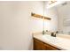 Clean bathroom features a vanity with a light countertop, a sink, and a mirror at 2519 Hitchcock Dr, Durham, NC 27705