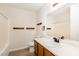 Bathroom features a white sink and vanity, toilet, and shower with curtain at 2519 Hitchcock Dr, Durham, NC 27705