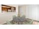 Cozy dining space featuring a round marble table, comfortable seating for four, adjacent to the kitchen at 2519 Hitchcock Dr, Durham, NC 27705