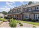 Attractive townhouse with brick and vinyl siding, plus neatly trimmed shrubbery at 2519 Hitchcock Dr, Durham, NC 27705