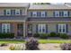 Charming townhouse exterior with blue shutters and well-maintained landscaping at 2519 Hitchcock Dr, Durham, NC 27705