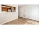 A living area with wood-look flooring, open to the kitchen, providing ample storage at 2519 Hitchcock Dr, Durham, NC 27705