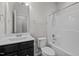Clean bathroom featuring a white vanity, commode, and shower/tub combination with modern fixtures at 256 Rubrum Dr, Hillsborough, NC 27278