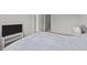 Bedroom with a tv and access to the ensuite bathroom at 256 Rubrum Dr, Hillsborough, NC 27278