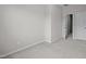 Neutral bedroom showcasing carpeting and an entrance to a walk in closet at 256 Rubrum Dr, Hillsborough, NC 27278