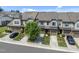 Street view of townhomes with 2 car garages at 256 Rubrum Dr, Hillsborough, NC 27278