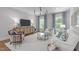 Bright living room with a contemporary design and a neutral color palette with blue accents at 2711 Jordan Pointe Blvd, New Hill, NC 27562