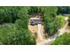 New home in a wooded location with a long driveway and attached garage at 295 Rudd Rd, Youngsville, NC 27596