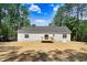 A view of the backyard with a newly installed deck at 295 Rudd Rd, Youngsville, NC 27596