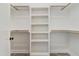 Walk-in closet with built-in shelving and rods, offering ample storage space at 295 Rudd Rd, Youngsville, NC 27596