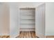 Open closet with adjustable shelving for optimal storage and organization at 295 Rudd Rd, Youngsville, NC 27596