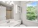 Bathroom featuring white vanity and shower at 3 Cobble Glen Ct, Durham, NC 27713