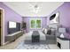 Calm bedroom featuring a large window, ceiling fan and neutral decor at 3 Cobble Glen Ct, Durham, NC 27713