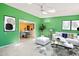 Bright sun room leading to dining area and featuring ample natural light at 3 Cobble Glen Ct, Durham, NC 27713