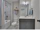 Cozy bathroom featuring a tub-shower combination, vanity, and modern fixtures at 3003 University Dr, Durham, NC 27707
