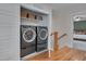 Convenient laundry room with modern front loading washer and dryer at 3003 University Dr, Durham, NC 27707