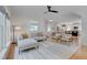 Bright, open living room with modern decor, hardwood floors and access to kitchen and dining areas at 3003 University Dr, Durham, NC 27707