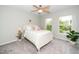 Bright guest bedroom with ample natural light and neutral colors at 3034 Winfred Dell Ln, Cary, NC 27511