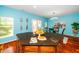 Bright kitchen boasts a large island with granite countertops and wooden cabinets and stainless steel decor at 3034 Winfred Dell Ln, Cary, NC 27511
