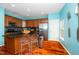 Modern kitchen with an island, stainless steel appliances, and sleek countertops at 3034 Winfred Dell Ln, Cary, NC 27511