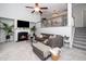 Inviting living room featuring a fireplace, plush seating, and neutral tones creating a cozy atmosphere at 3034 Winfred Dell Ln, Cary, NC 27511