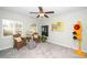 Bright sitting room with ample natural light and stylish décor at 3034 Winfred Dell Ln, Cary, NC 27511