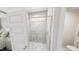 Bathroom features a modern glass enclosed shower with stylish marble-patterned tiles, offering a spa-like experience at 309 Beacon Dr, Pittsboro, NC 27312