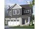 Charming two-story home featuring a brick garage, gray siding, and a welcoming front porch at 309 Beacon Dr, Pittsboro, NC 27312