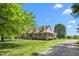 Charming two-story brick home with a large wrap-around porch and dormer windows at 319 Knox Rd, Gibsonville, NC 27249