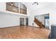 Bright living room showcasing a cozy fireplace, hardwood floors, and natural light at 319 Knox Rd, Gibsonville, NC 27249