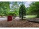 Entrance to the Neuse River Trail, marked by a sign amidst natural surroundings, inviting residents to explore the outdoors at 3325 Falls River Ave, Raleigh, NC 27614