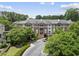 Aerial view of the community surrounded by mature trees at 340 Allister Dr # 301, Raleigh, NC 27609