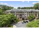 Aerial view of the community with parking and mature trees at 340 Allister Dr # 301, Raleigh, NC 27609