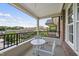 Balcony with black railing, table with chairs, and view of the neighborhood at 340 Allister Dr # 301, Raleigh, NC 27609