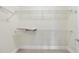Walk-in closet with white wire shelving; ready for storage and organization at 340 Allister Dr # 301, Raleigh, NC 27609