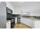 Modern kitchen with stainless steel appliances and granite countertops, ideal for cooking and entertaining at 340 Allister Dr # 301, Raleigh, NC 27609