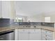Kitchen features stainless steel appliances, granite countertops, and a gray tile backsplash at 340 Allister Dr # 301, Raleigh, NC 27609