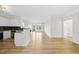 Bright and airy open-concept living area featuring hardwood floors and windows with an outside view at 340 Allister Dr # 301, Raleigh, NC 27609