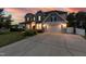 Charming two-story home with a well-manicured lawn, and a wide driveway at 3536 Greenville Loop Rd, Wake Forest, NC 27587