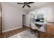 Office space with desk, ceiling fan, hardwood floors, and natural light from window at 3536 Greenville Loop Rd, Wake Forest, NC 27587