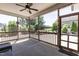 Relaxing screened porch with ceiling fan, string lights and views of the lush backyard at 3536 Greenville Loop Rd, Wake Forest, NC 27587