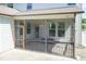 Enjoy a relaxing screened porch, perfect for outdoor entertaining and lounging at 3536 Greenville Loop Rd, Wake Forest, NC 27587