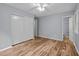 Spacious bedroom includes a large closet with sliding doors, ceiling fan and neutral wall color at 4119 Toroella St, Durham, NC 27704