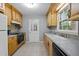Bright kitchen with updated countertops, appliances, and ample cabinet space at 4119 Toroella St, Durham, NC 27704