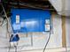 Whole house air purifier with blue exterior is located in the basement at 4220 Hope Valley Road Rd, Durham, NC 27707